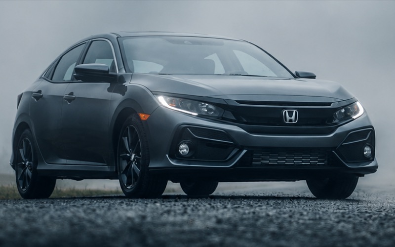 A grey Honda Civic hatchback